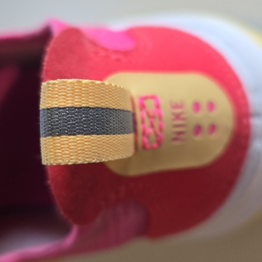 Nike Pink and Yellow Athletic Shoes with Sleek Design - Picture 6 of 6